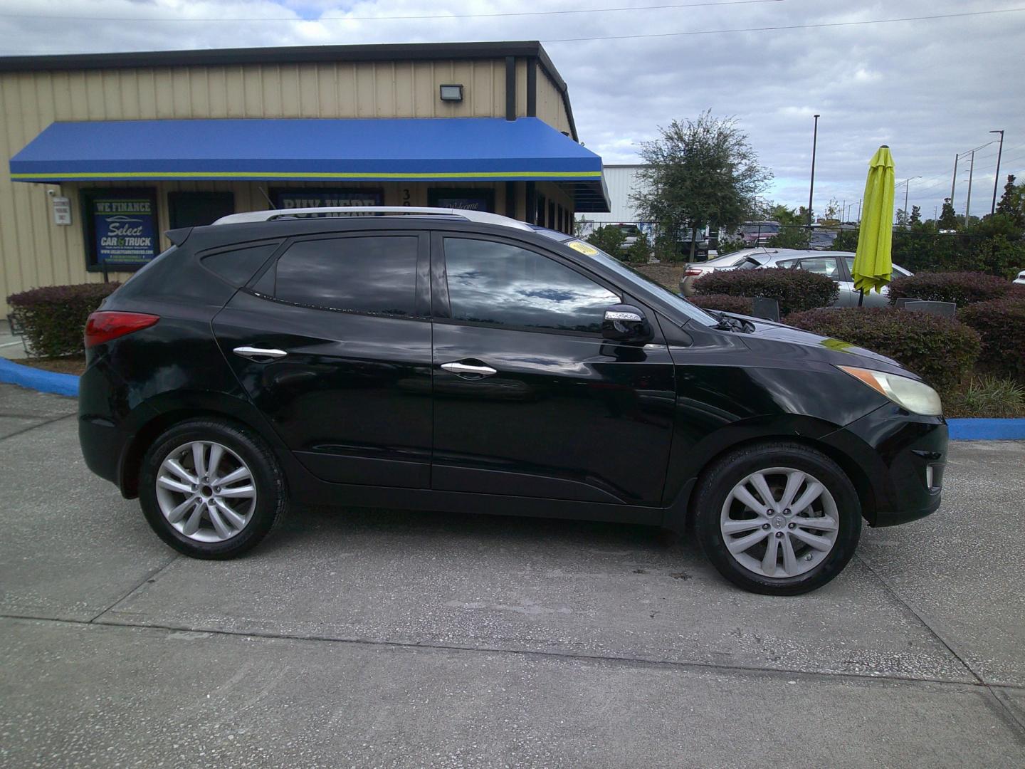 2011 BLACK HYUNDAI TUCSON GLS; LIMITED (KM8JU3AC0BU) , located at 390 Hansen Avenue, Orange Park, FL, 32065, (904) 276-7933, 30.130497, -81.787529 - Photo#2